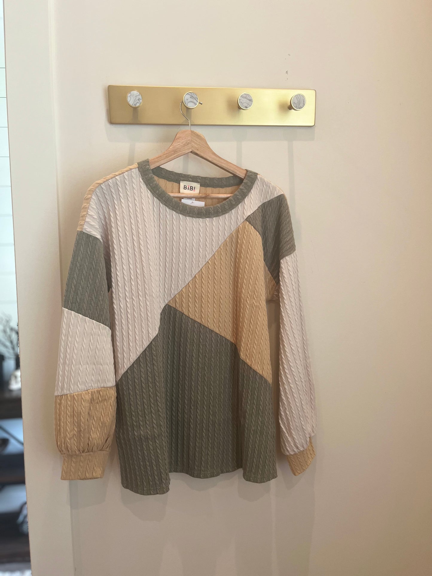 Green and mustard sweater